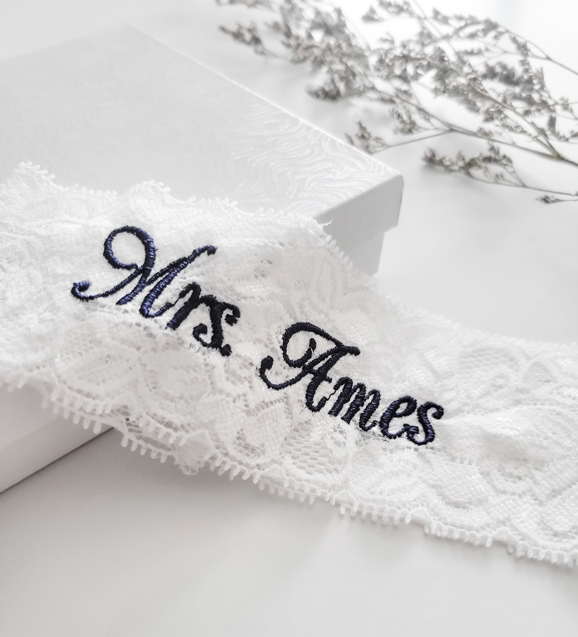 Embroidered Lace Garter With Navy Blue Thread