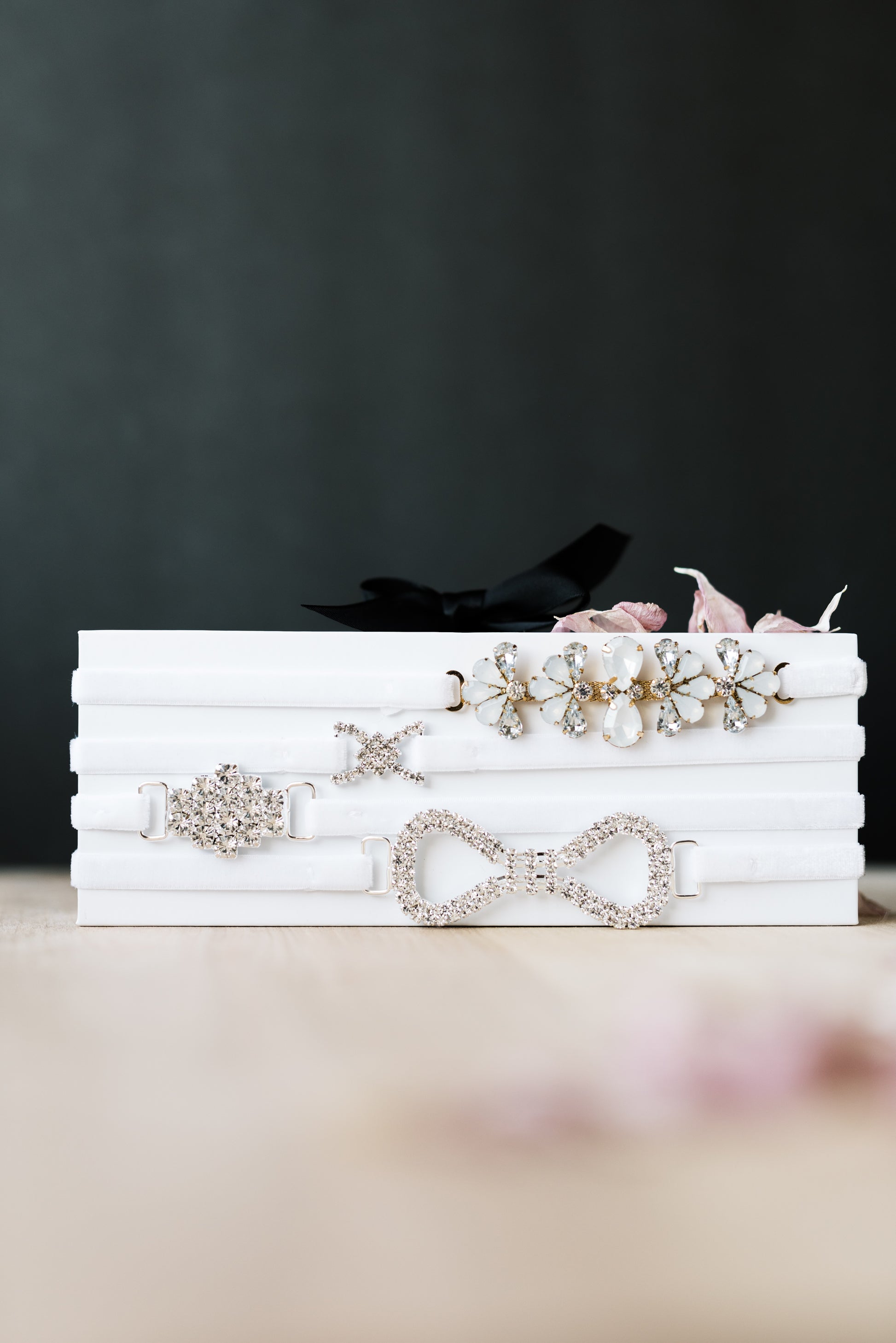 White velvet bridal garters with modern rhinestones