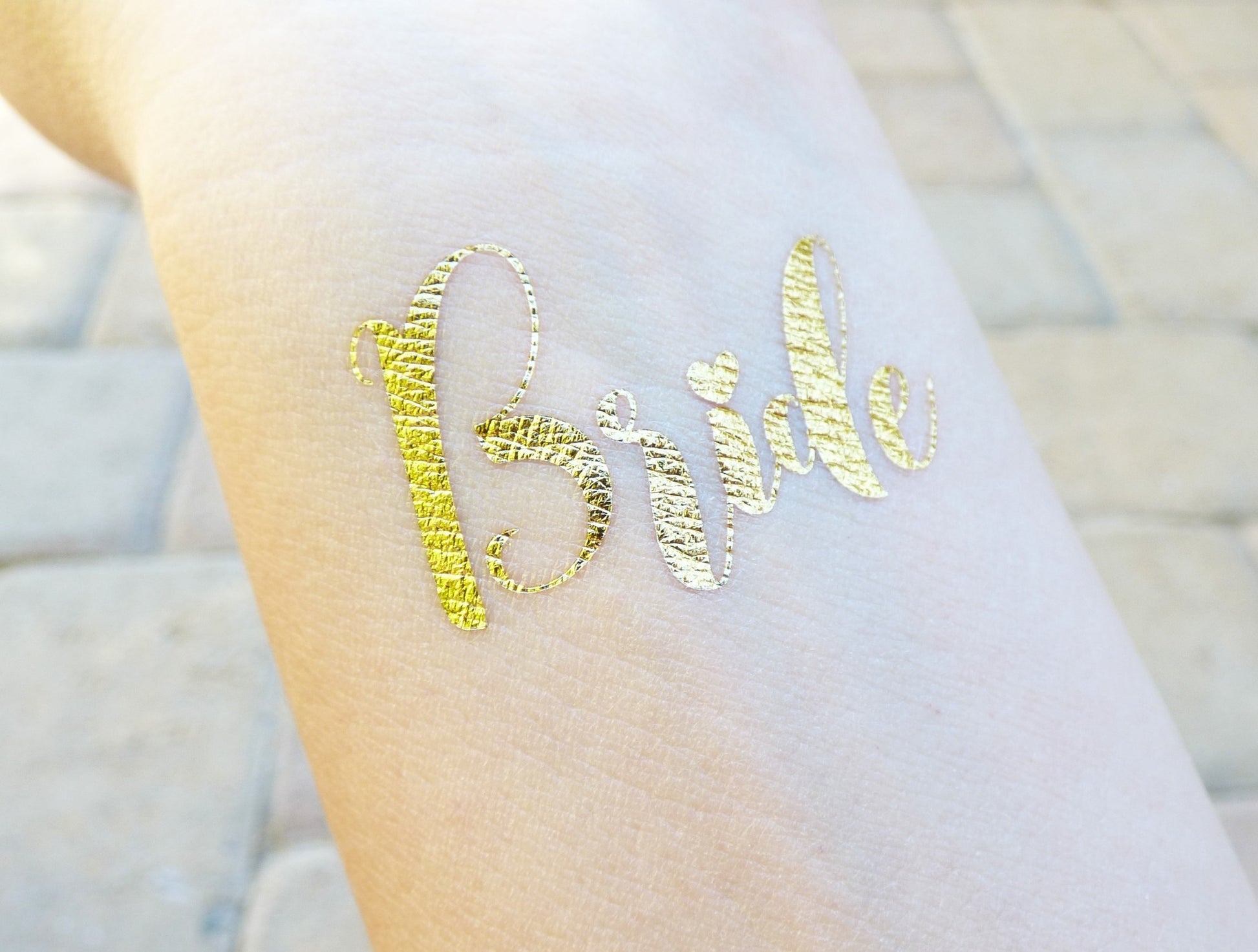 Bride temporary tattoo on wrist for bachelorette party
