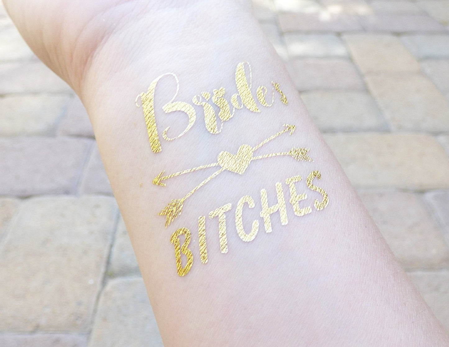 Bride's Bitches temporary tattoo with heart and arrows for bachelorette party